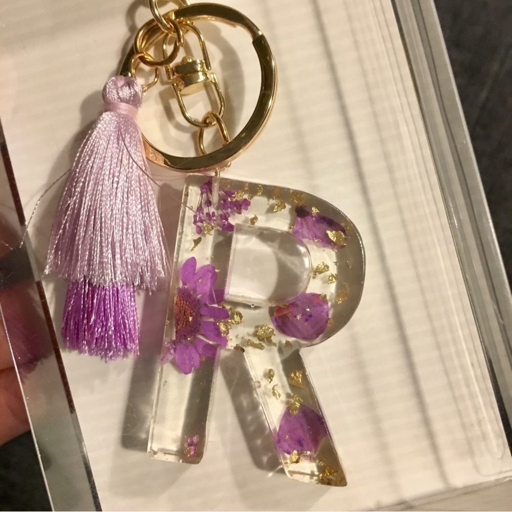 Floral “R” Initial Resin Keychain with Purple Tassles